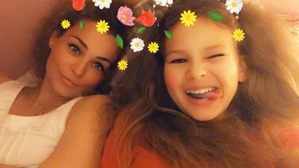 Charlotte and Anja cuddling with creativity